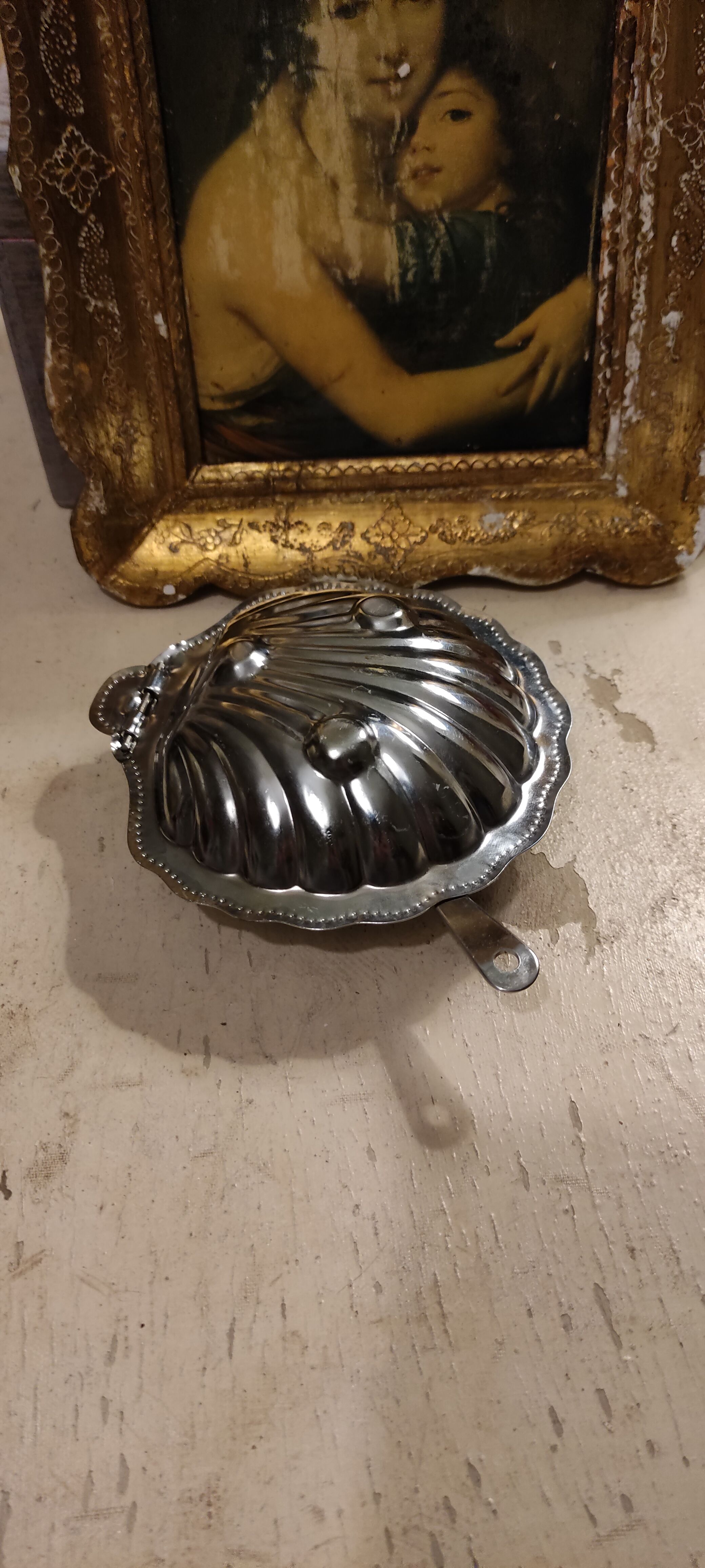 Vintage silver metal butter in shell shape