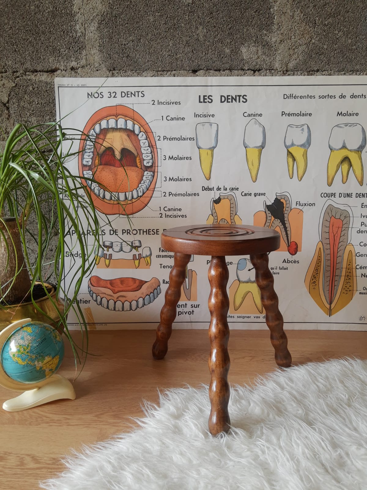 Low wood tripod stool turned countryside