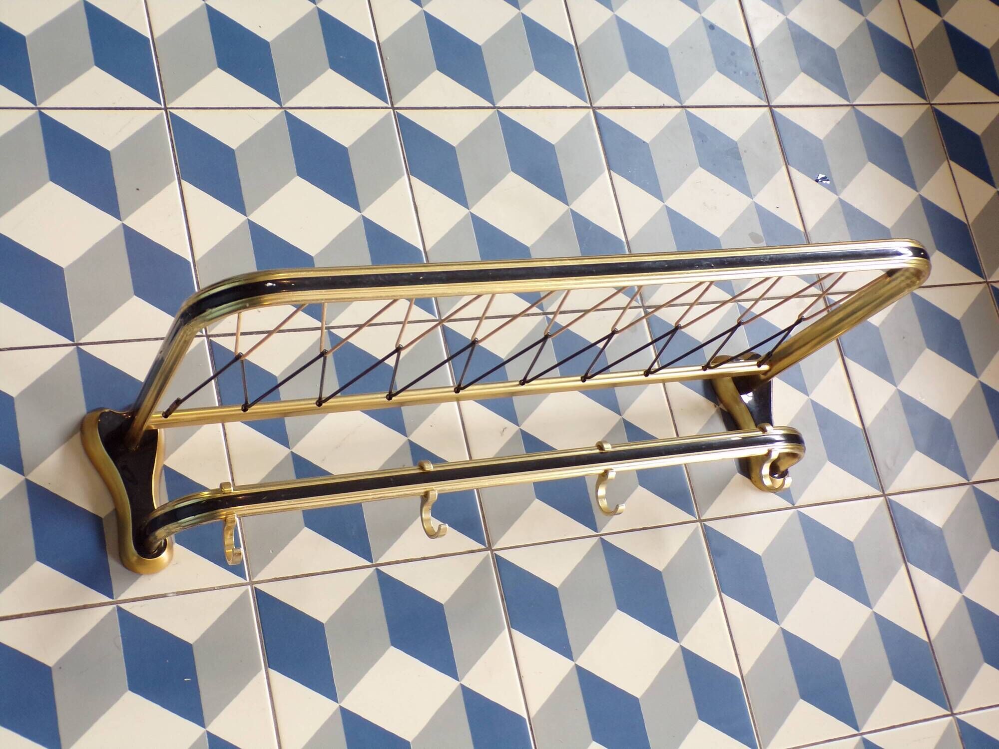 Vintage coat rack like a train luggage rack