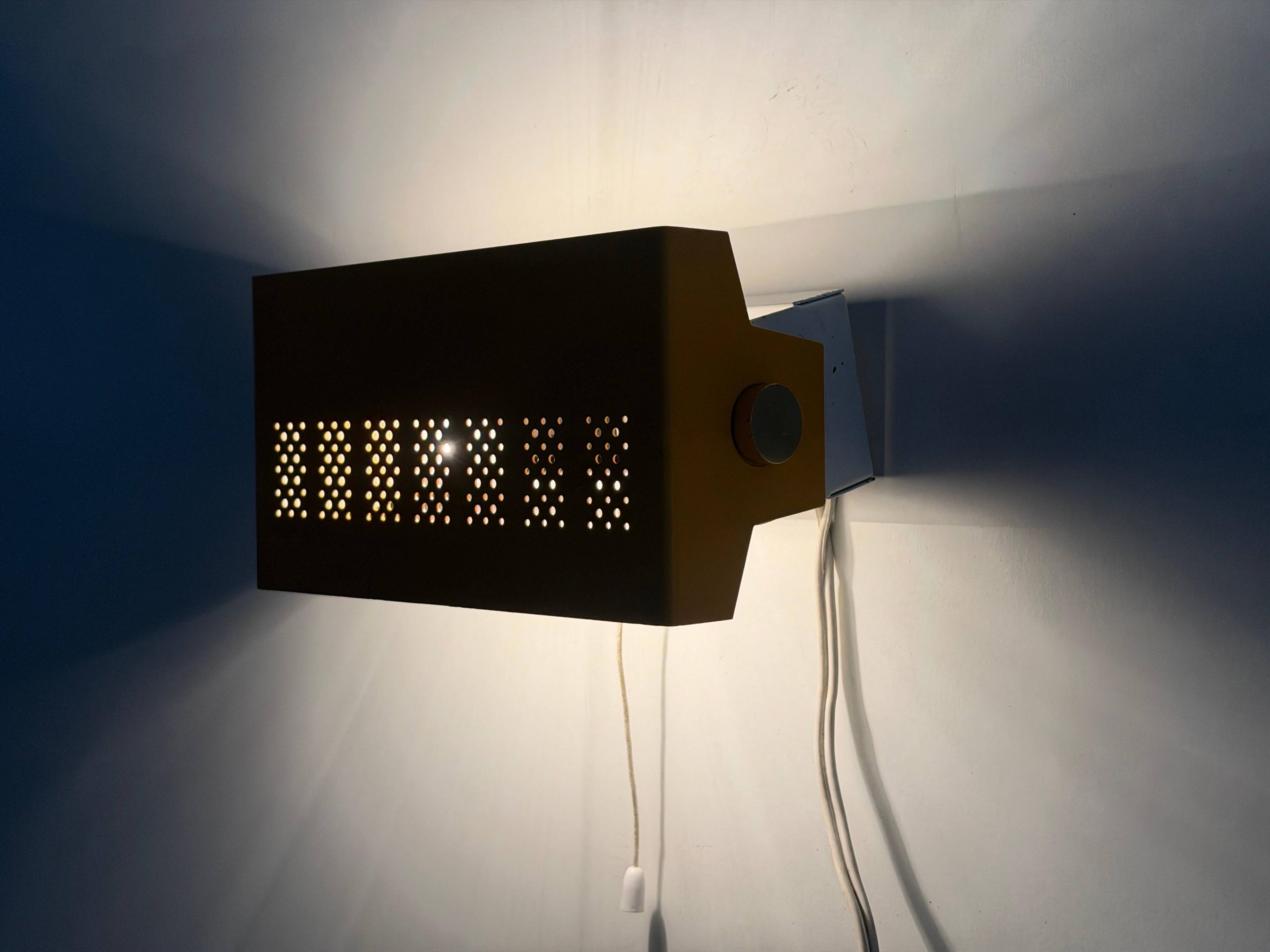 Pair of yellow metal wall lights from the mid-century by N Leuchten, 1960s, Germany.