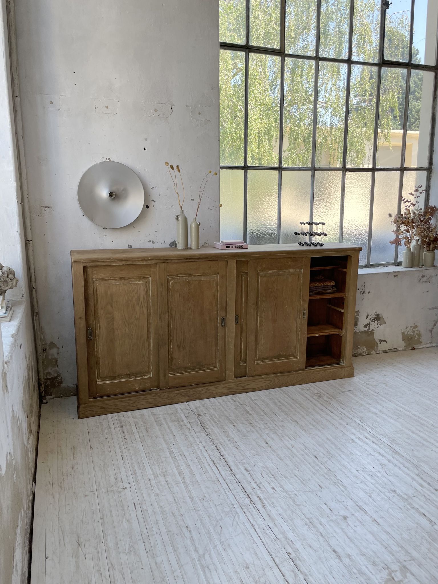 Large row of solid oak loom sliding doors