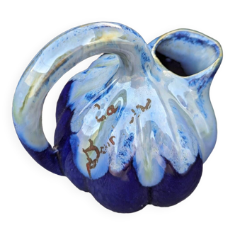 Small blue ceramic pitcher
