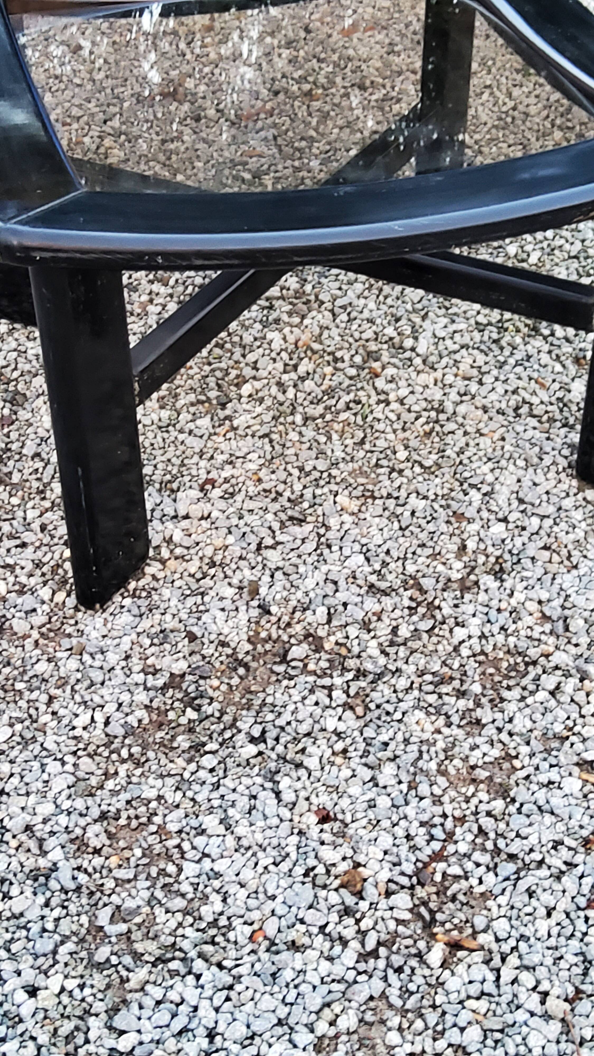 70s design coffee table in black lacquered wood with smoked glass top