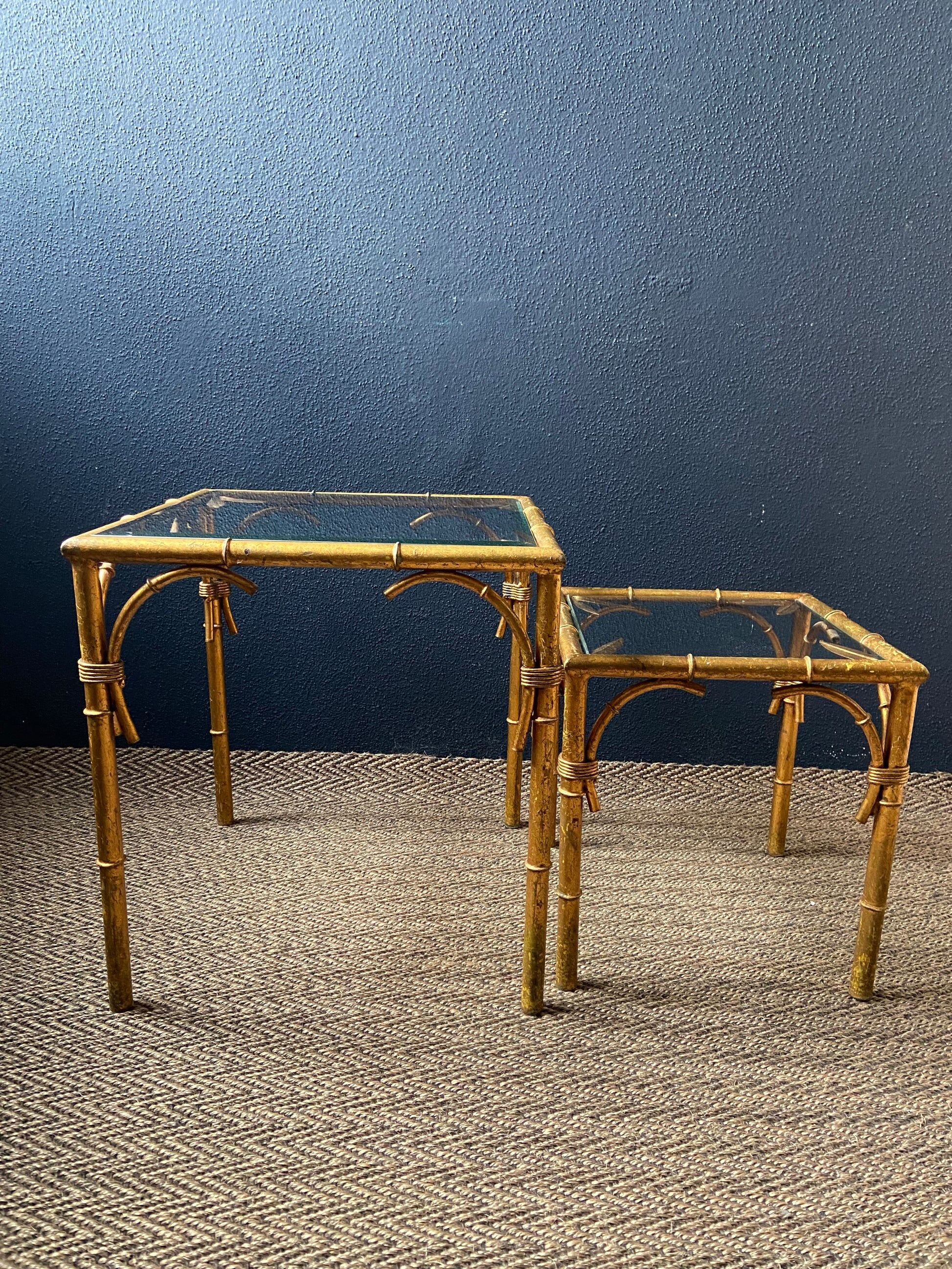 Pair of nesting tables in faux bamboo with glass tops, France, 1960s.