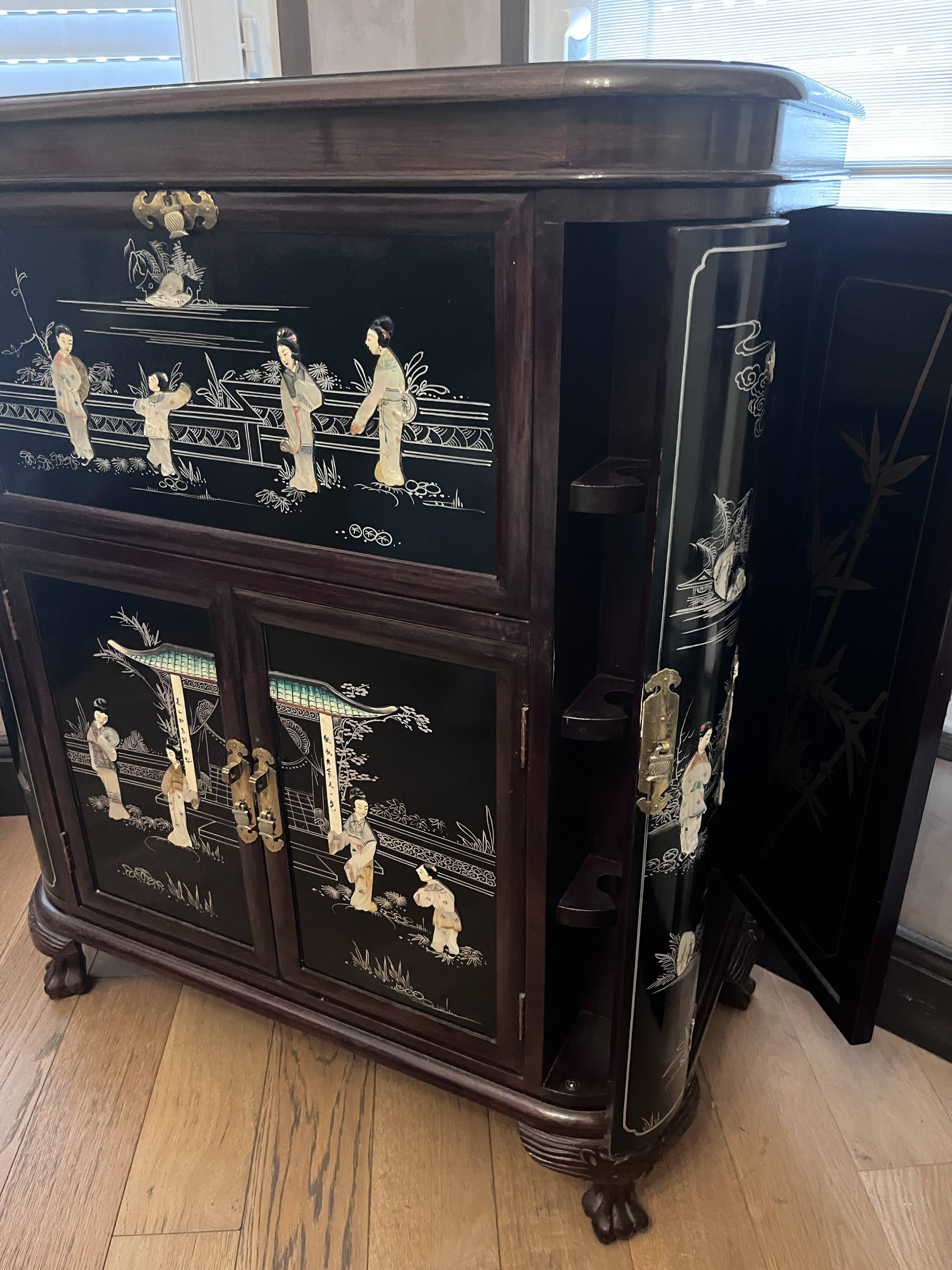 "Chinese black lacquer cabinet, mother-of-pearl inlays, court scenes"