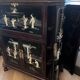"Chinese black lacquer cabinet, mother-of-pearl inlays, court scenes"