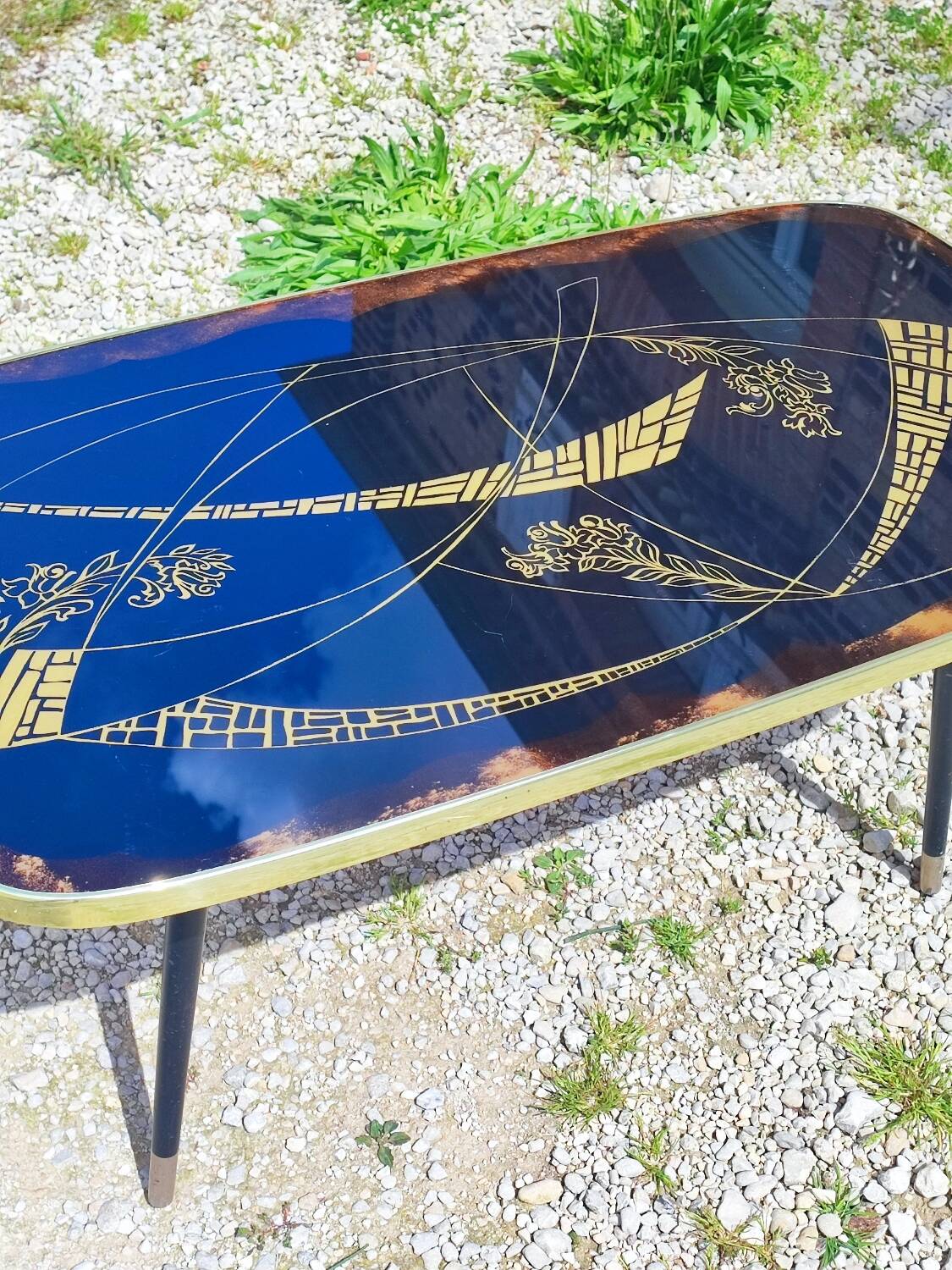 Vintage coffee table with compass legs