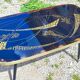 Vintage coffee table with compass legs
