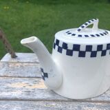 Ancient teapot and sugar pot
