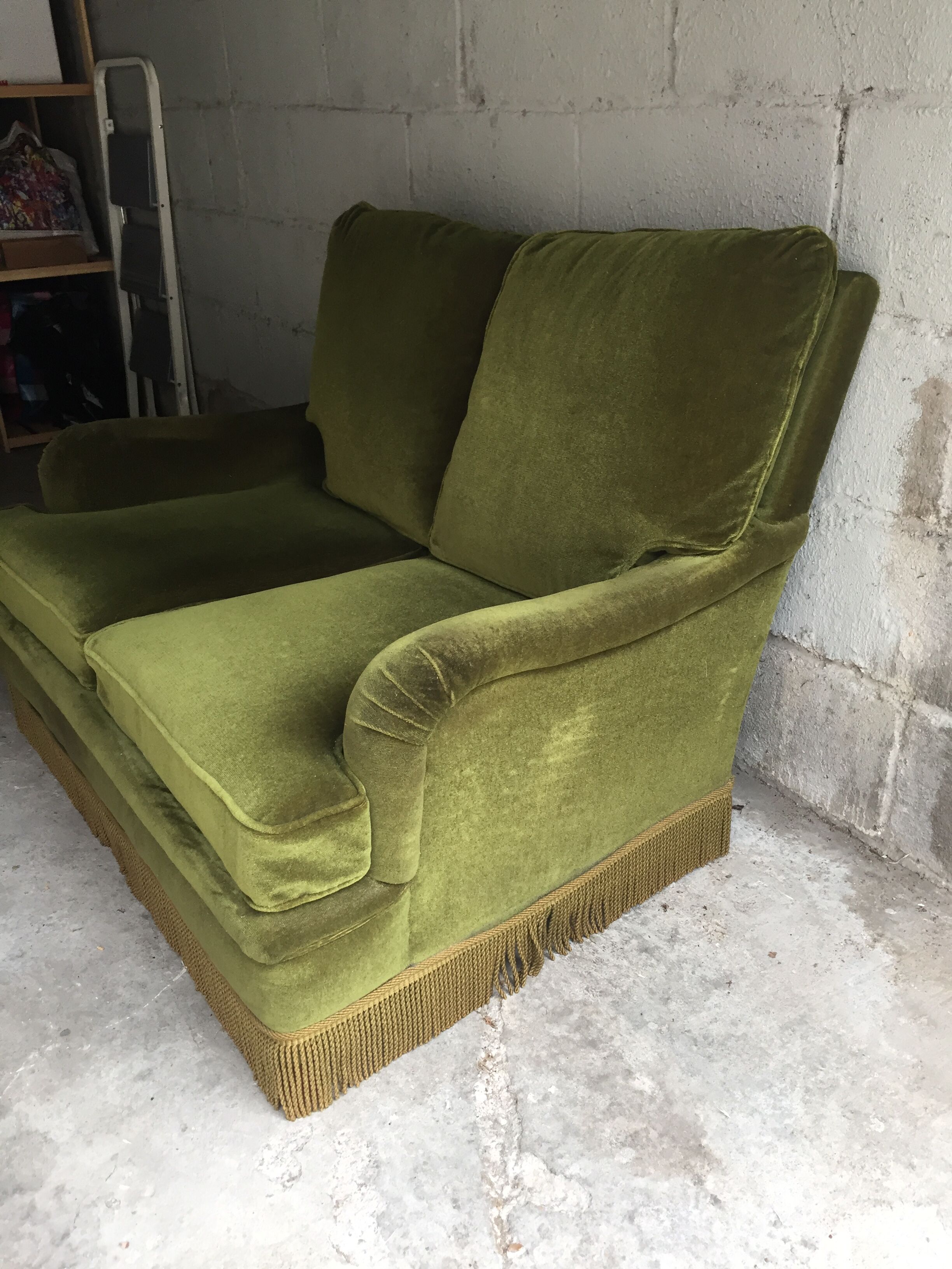 Vintage green velvet sofa