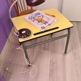 Old school desk in yellow formica