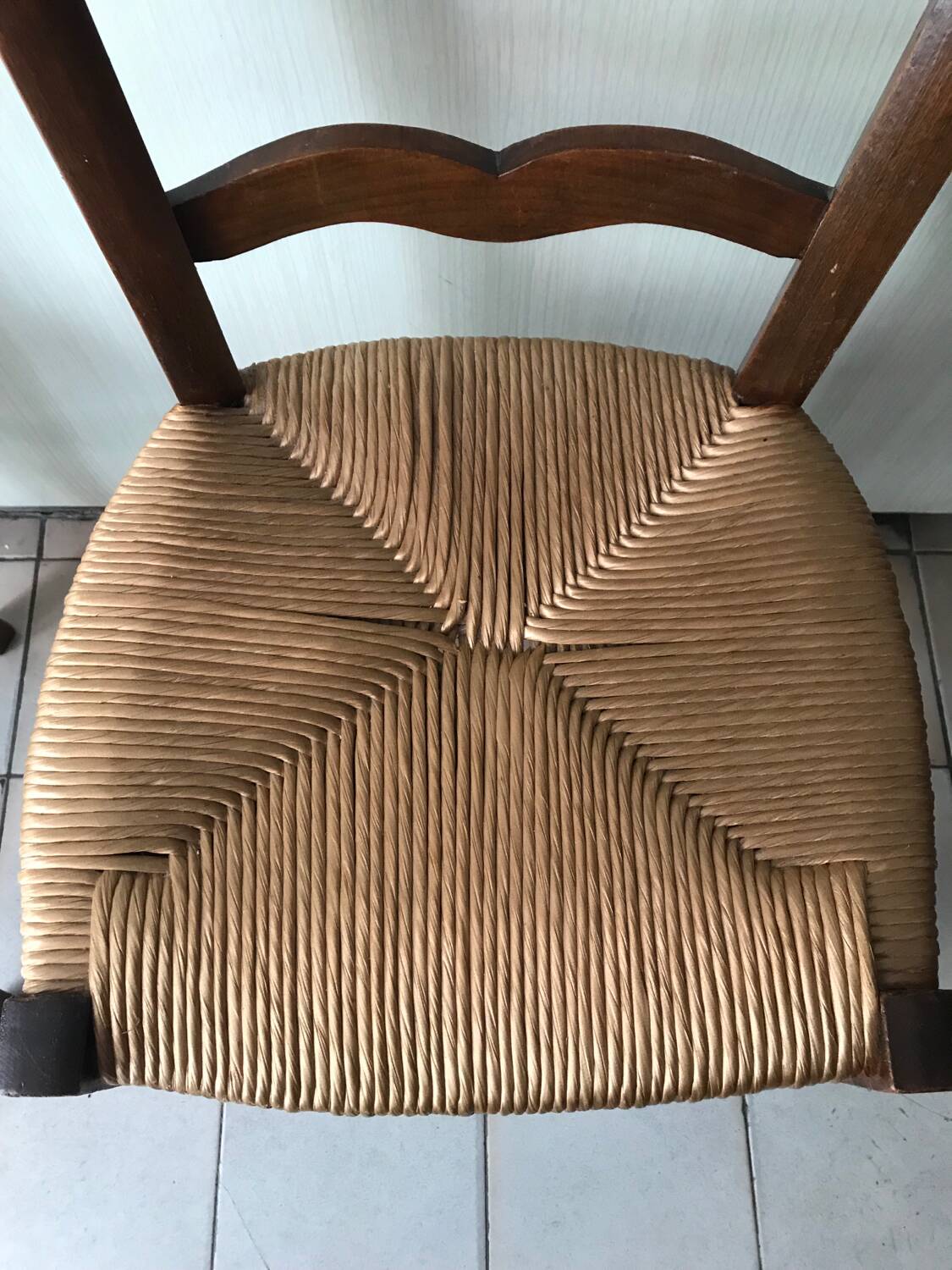 Wooden and straw chairs