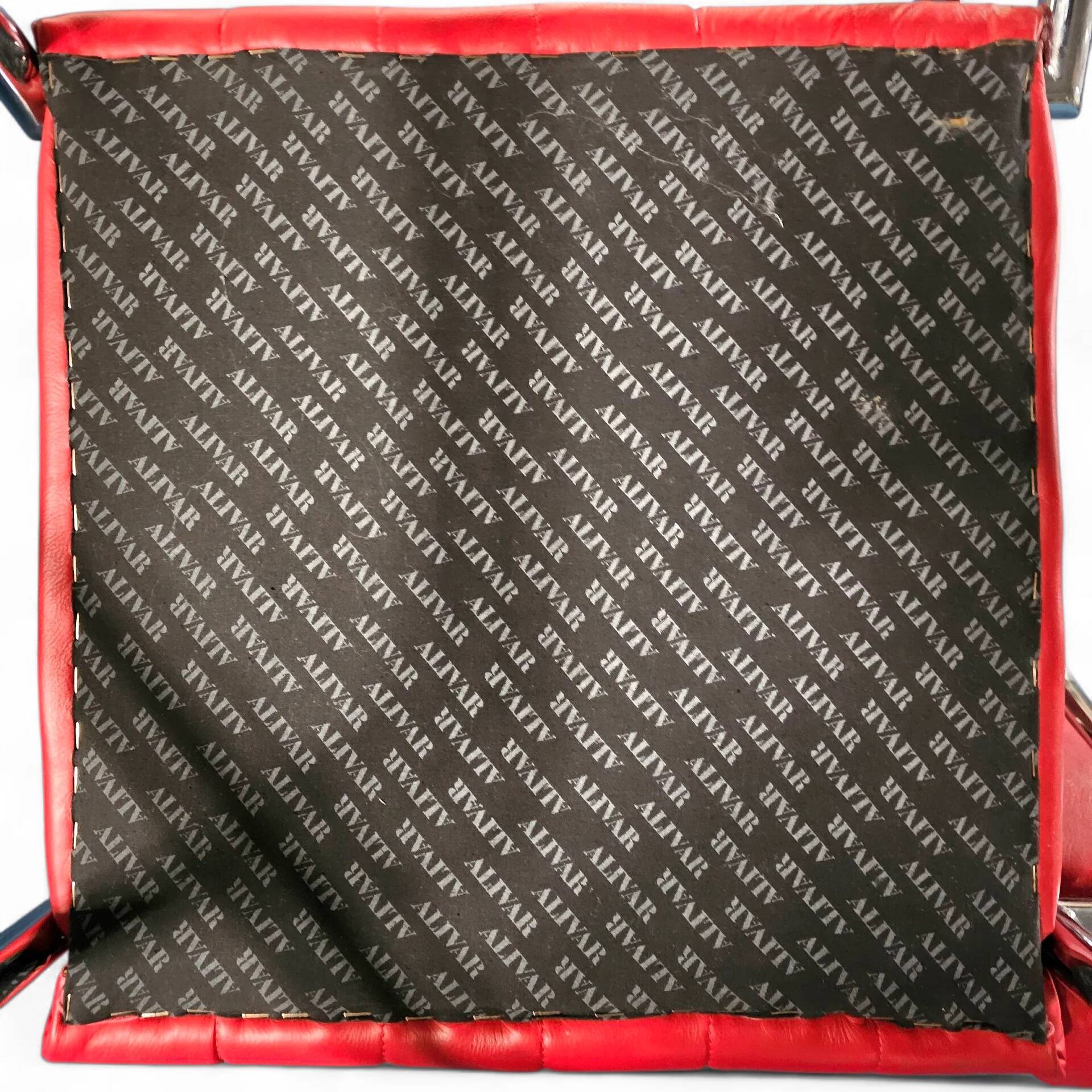 2 x Non-Conformist chair / Eileen Gray by Alivar / red leather / marked beneath the seat