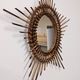 Starry sun mirror in rattan, France around 1960.