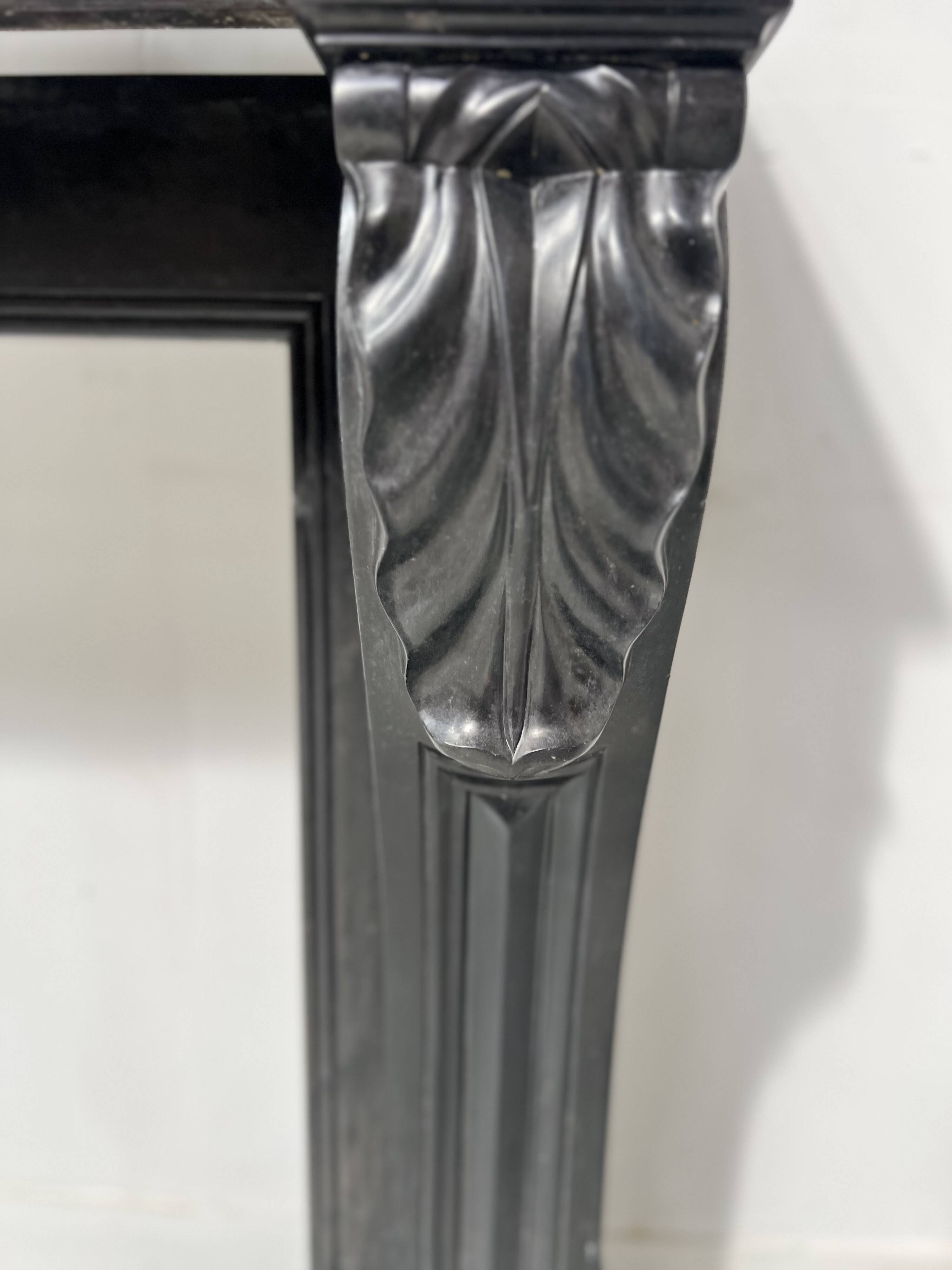 Napoleon III fireplace with claw feet in black marble, 19th century