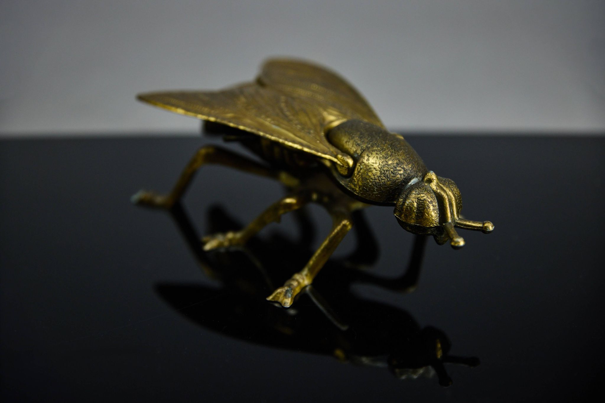 Sculptural ashtray in the shape of a giant fly in brass, Italy, circa 1950.