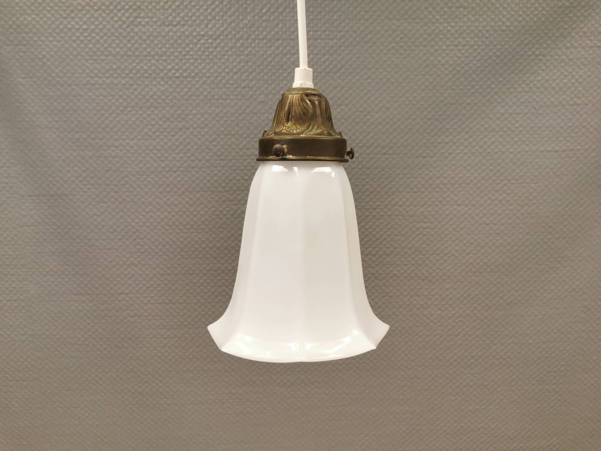 Small delicious tulip shaped hanging lamp in white opal glass with brass top.