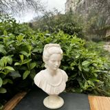 Alabaster bust of a woman signed Arnaldo Giannelli dated 1980.