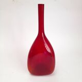 Triangular red glass vase by Gunnar Ander for Elme Glasbrück.