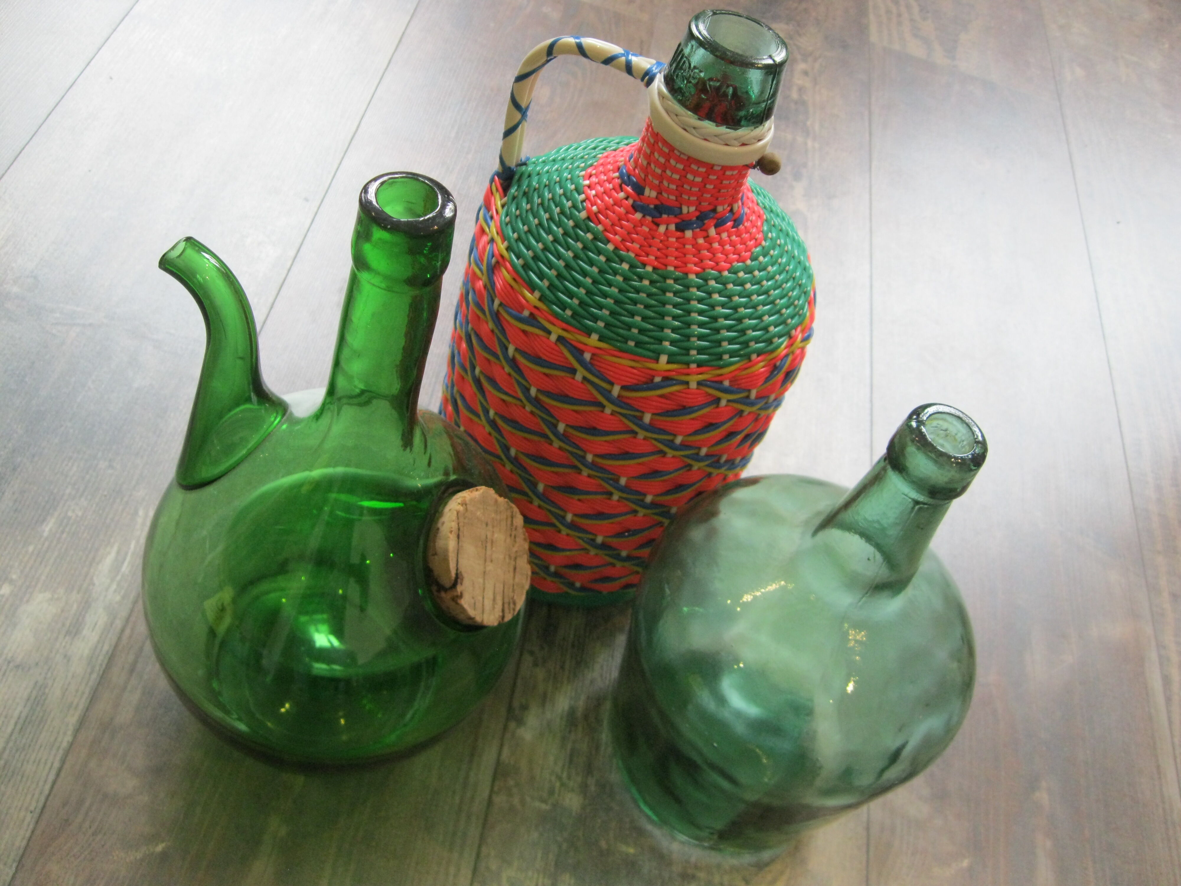 Vintage and multi-coloured demijohn