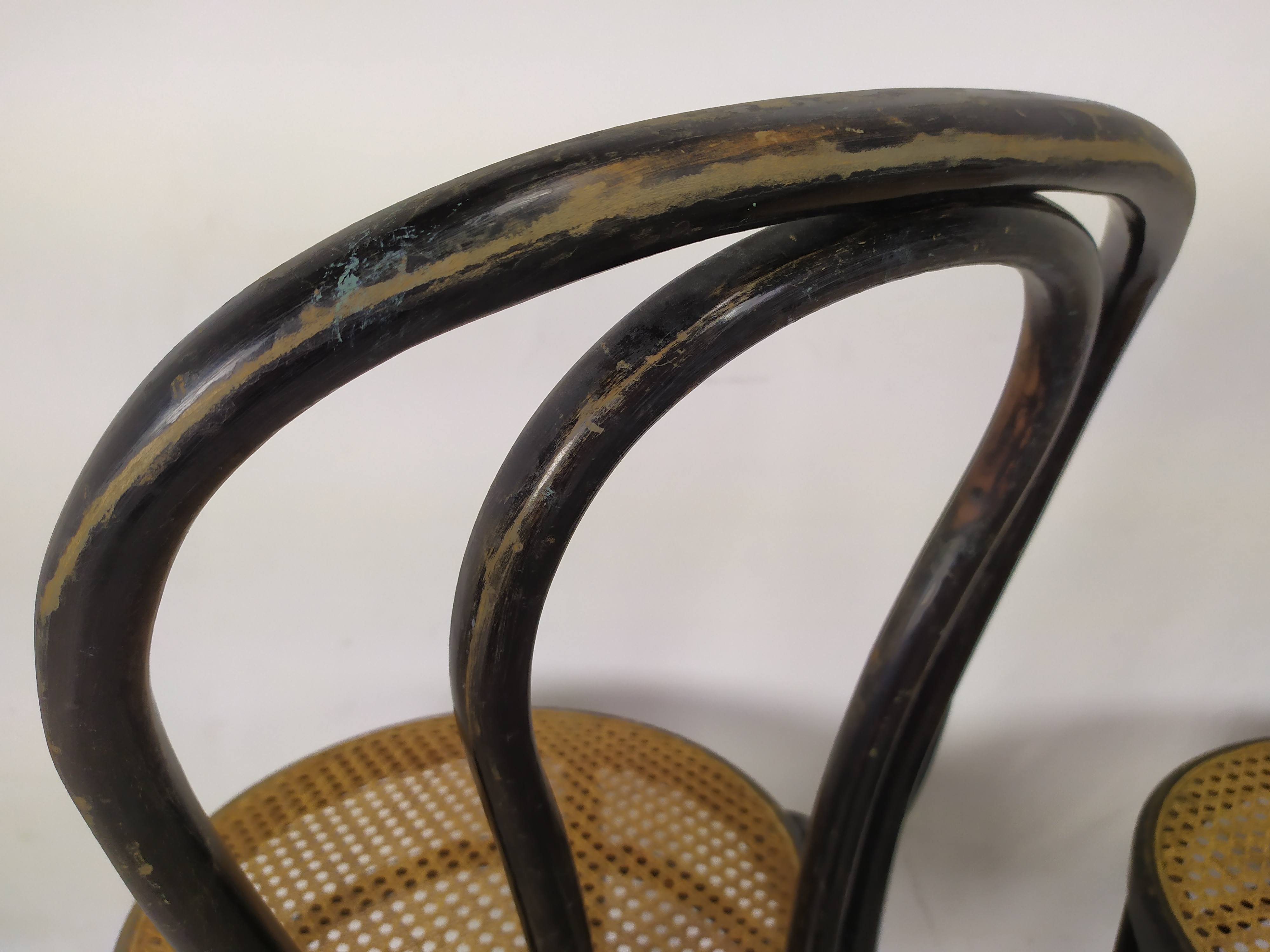 Black canned bistro chairs