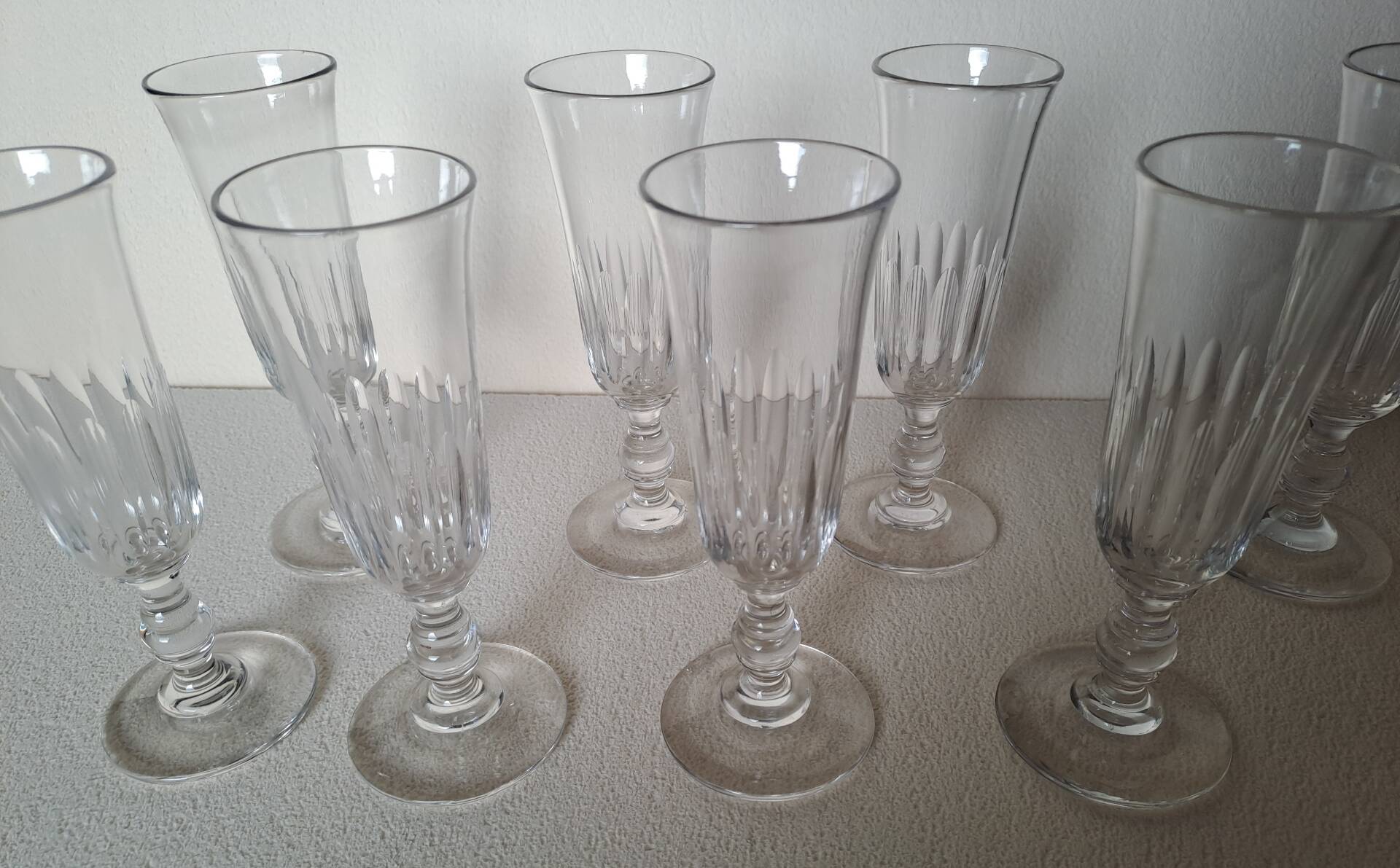 8 crystal Champagne flutes from Baccarat Saint Louis, 19th century.