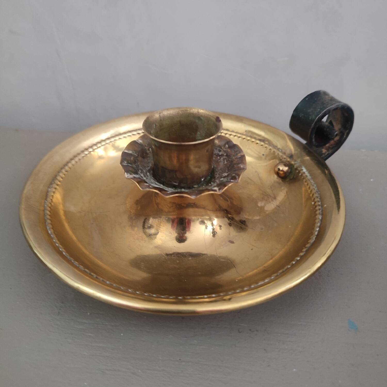 Brass cellar candle holder