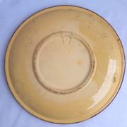 Assiette vintage aux motifs folkloriques et floraux