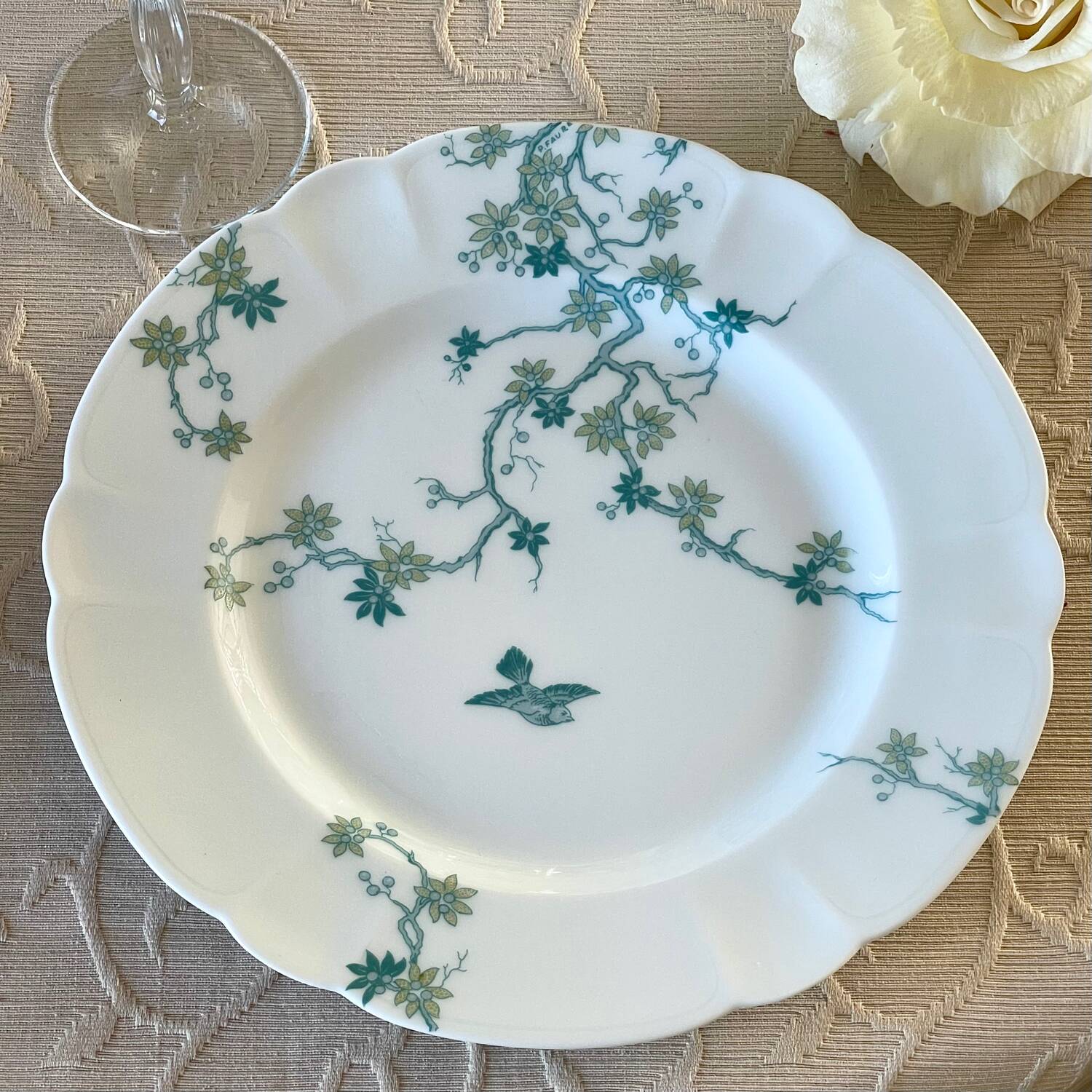 8 Haviland Limoges dinner plates.