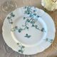 8 Haviland Limoges dinner plates.