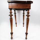 Antique game table with extention, of mahogany and walnut, 1860s