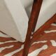 Vintage light gray armchair dark wood Scandinavian design 1970