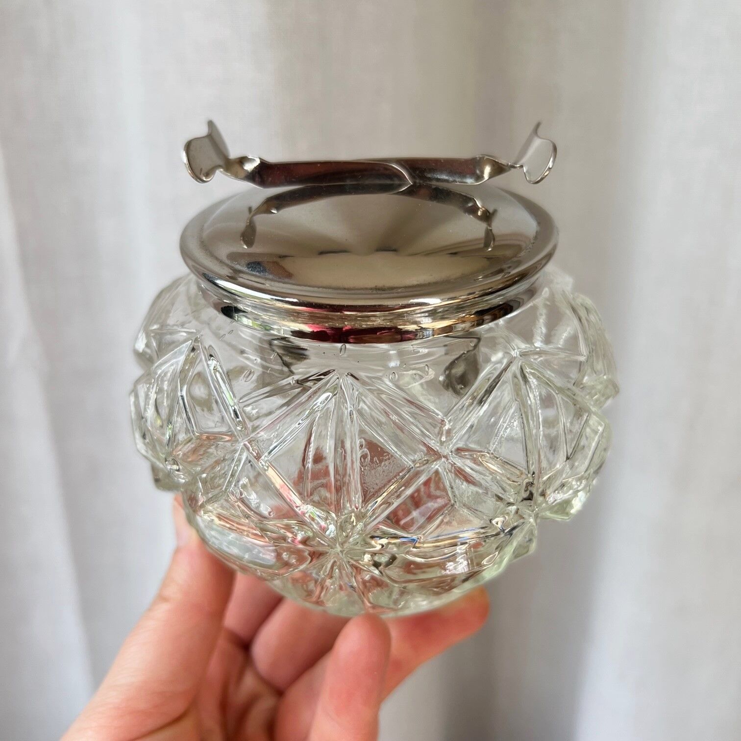 Glass and metal clamp