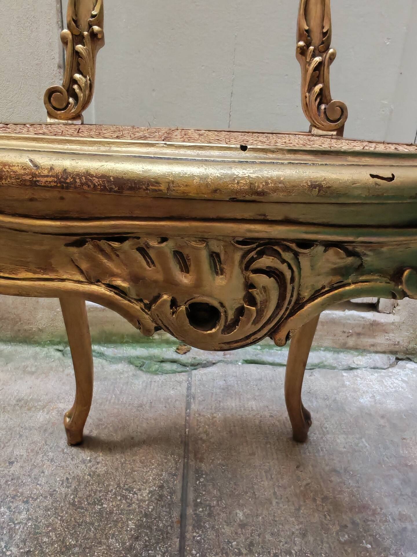 Antique rococo chair in gilded wood and caning
