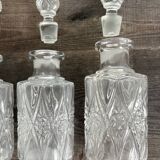 Set of 4 molded crystal bottles – Val Saint Lambert