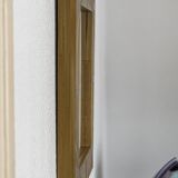 Mirror with straw marquetry frame