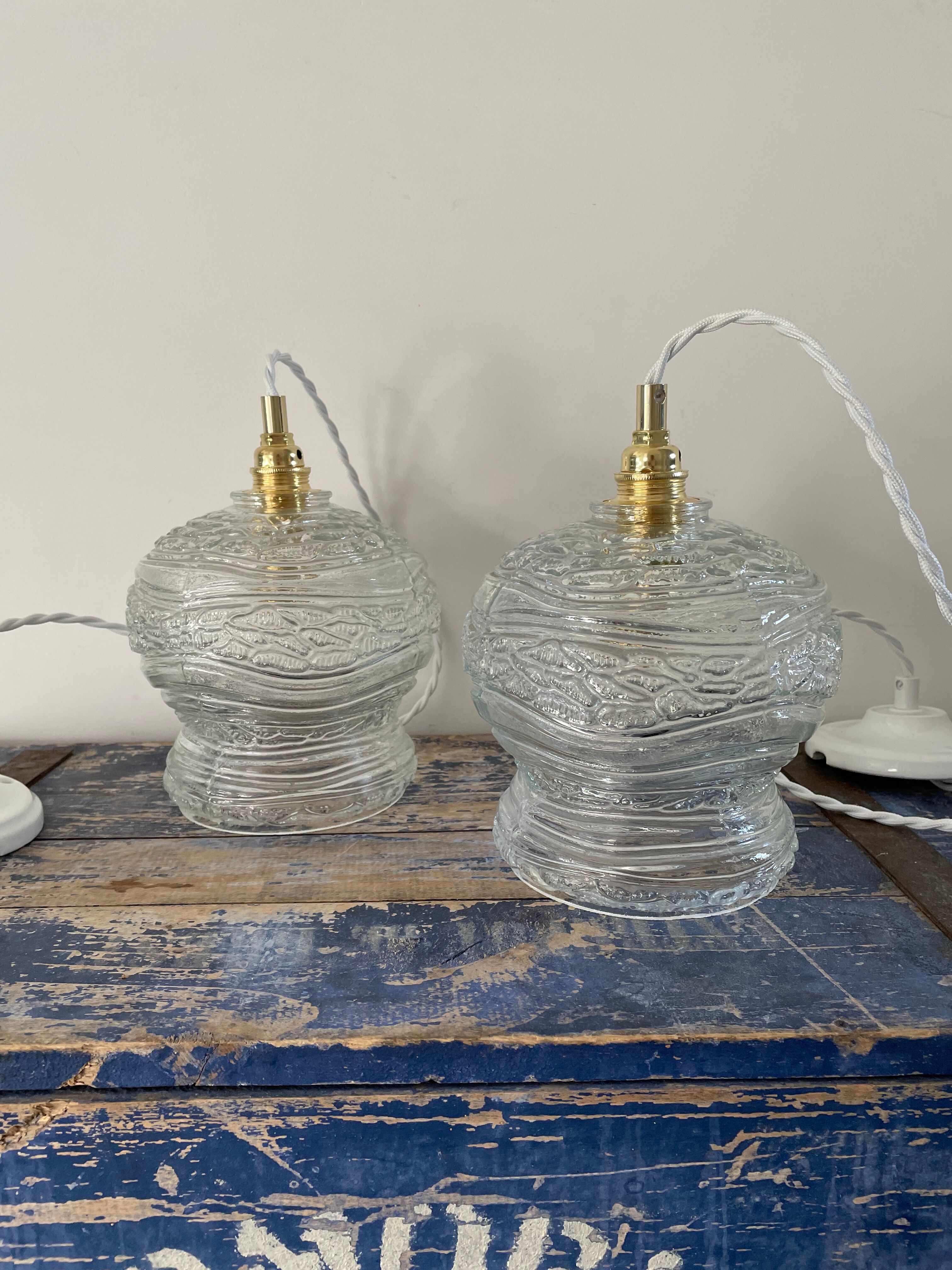Set of two vintage electrified glass pendant lamps