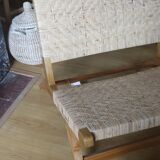 Teak and natural rattan armchair