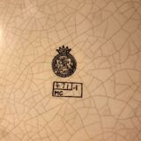 Enamelled trivet