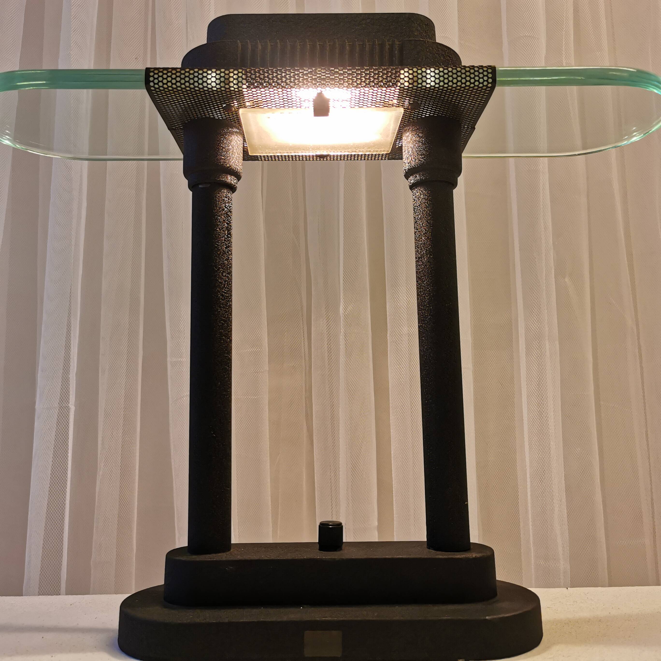 Desk lamp by “Robert Senneman”