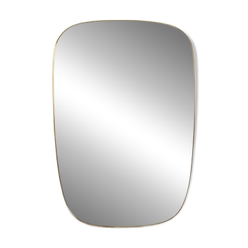 Mirror framed in gilded brass. 1980s