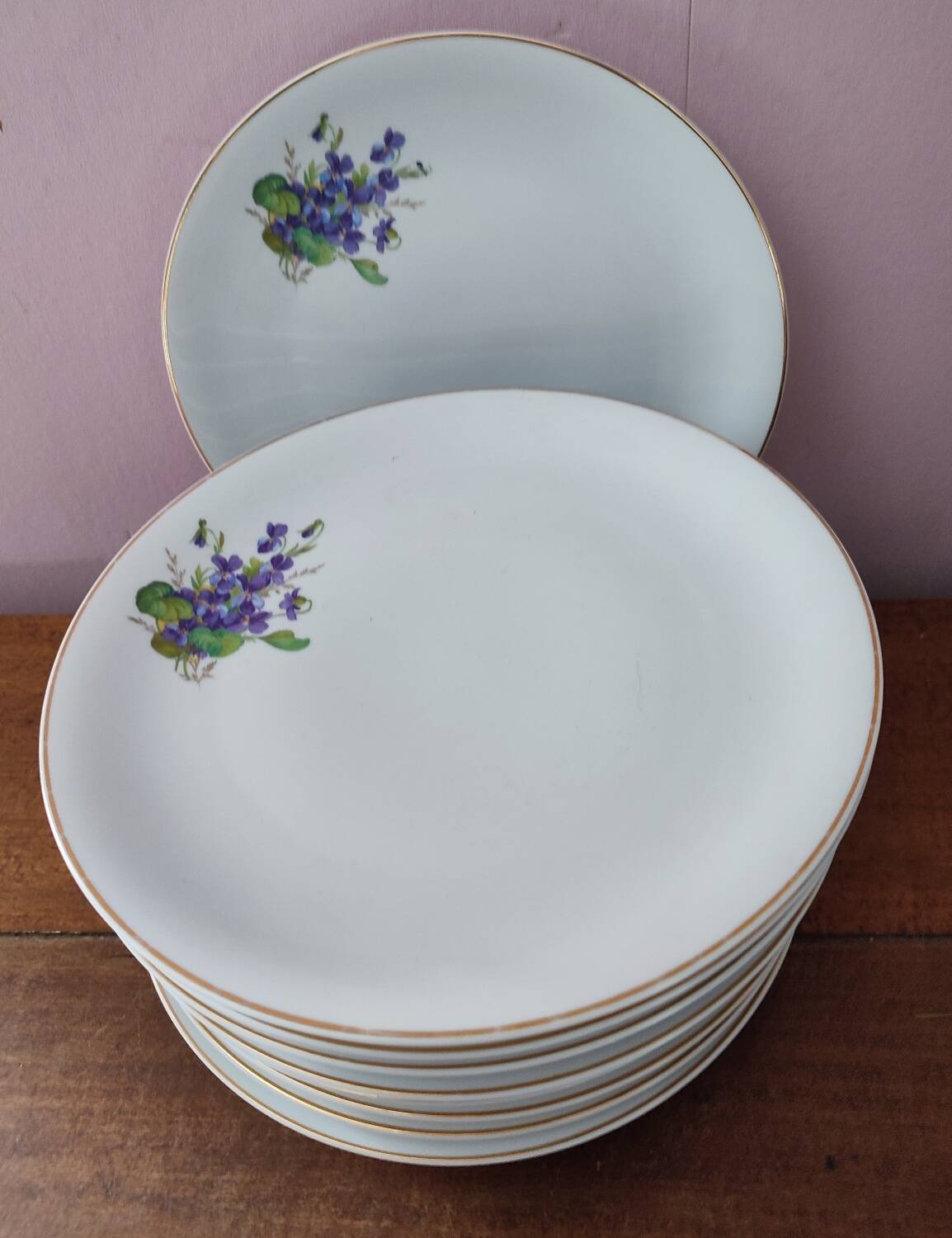 Set of 11 plates, Baudour porcelain