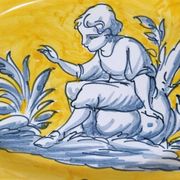 Pair of oval dishes in hand-painted faience with an Italian majolica spirit.