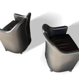 Pair of “S142” armchairs by Eugenio Gerli for Tecno – black leather
