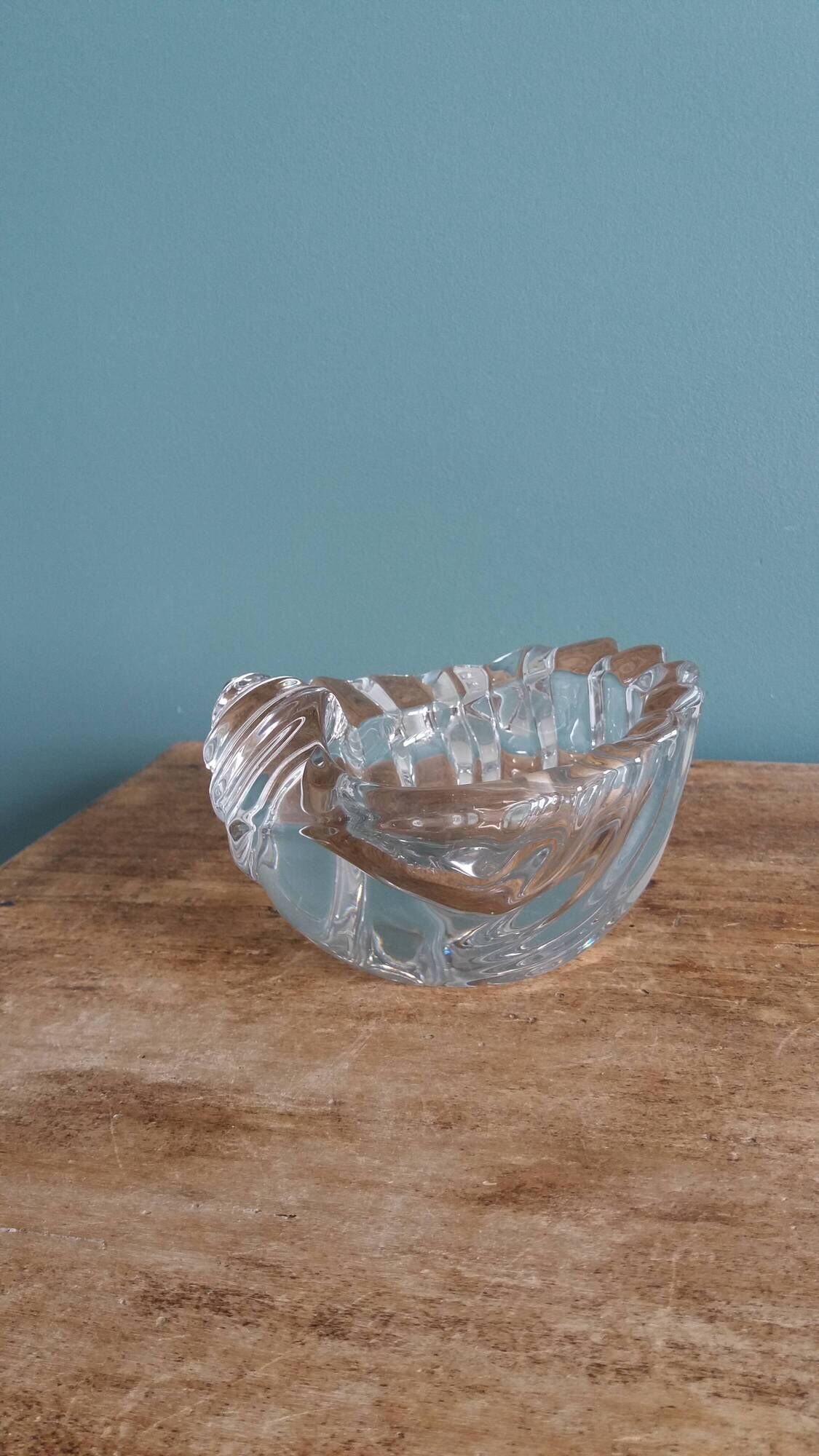 Shell-shaped crystal paperweight.