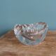 Shell-shaped crystal paperweight.
