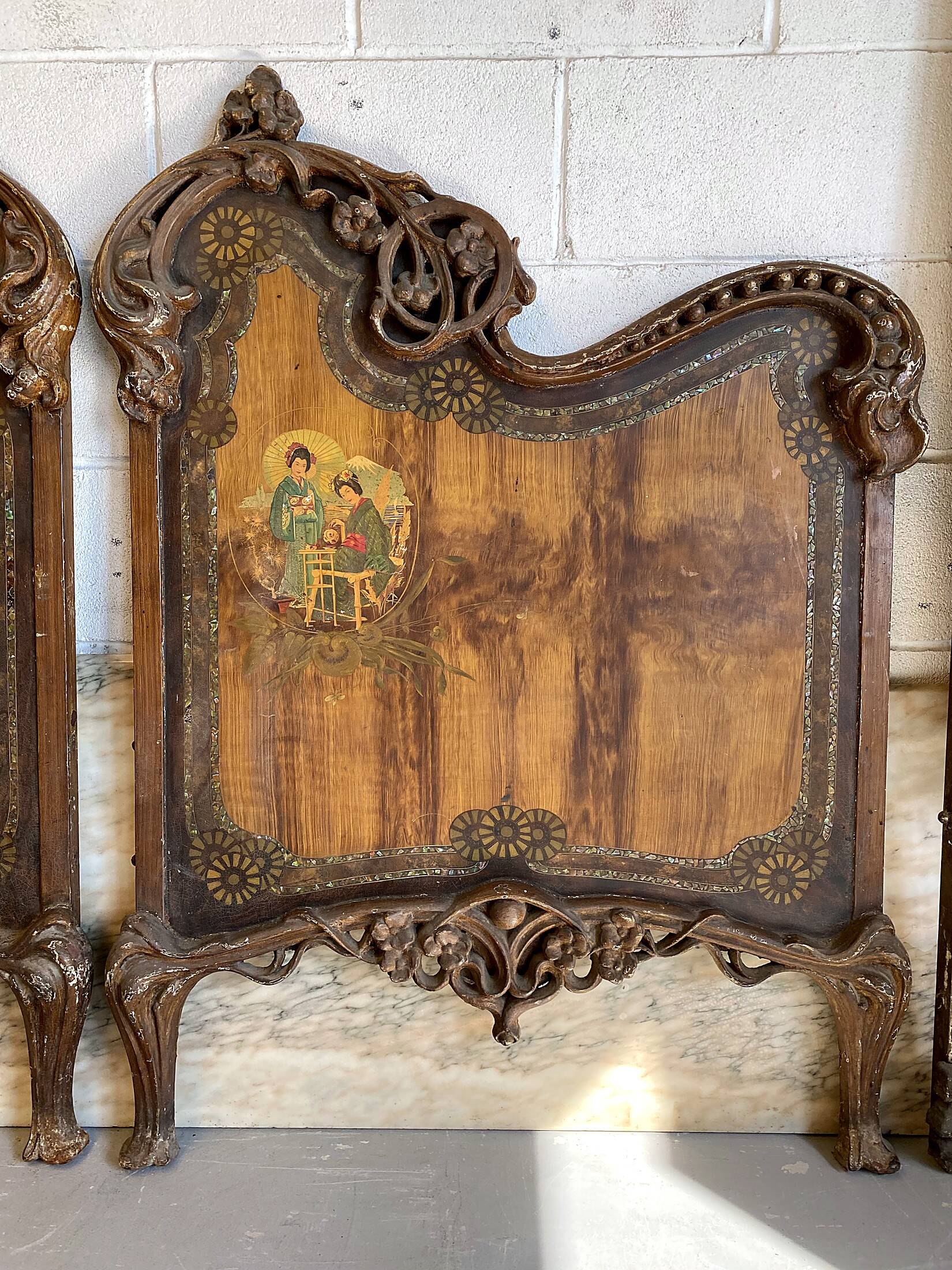 Pair of Art Nouveau cast iron headboards, Italy circa 1900