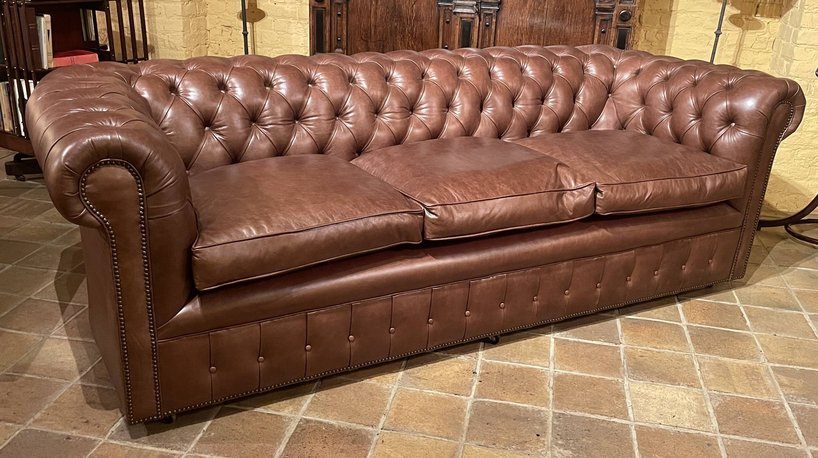 brown leather 3-seater Chesterfield sofa