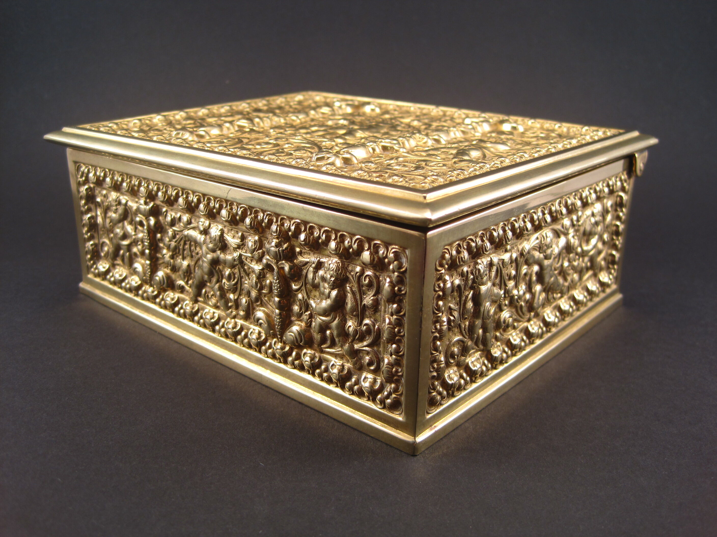 Golden brass cigar box manufactured by Erhard & Söhne around 1920