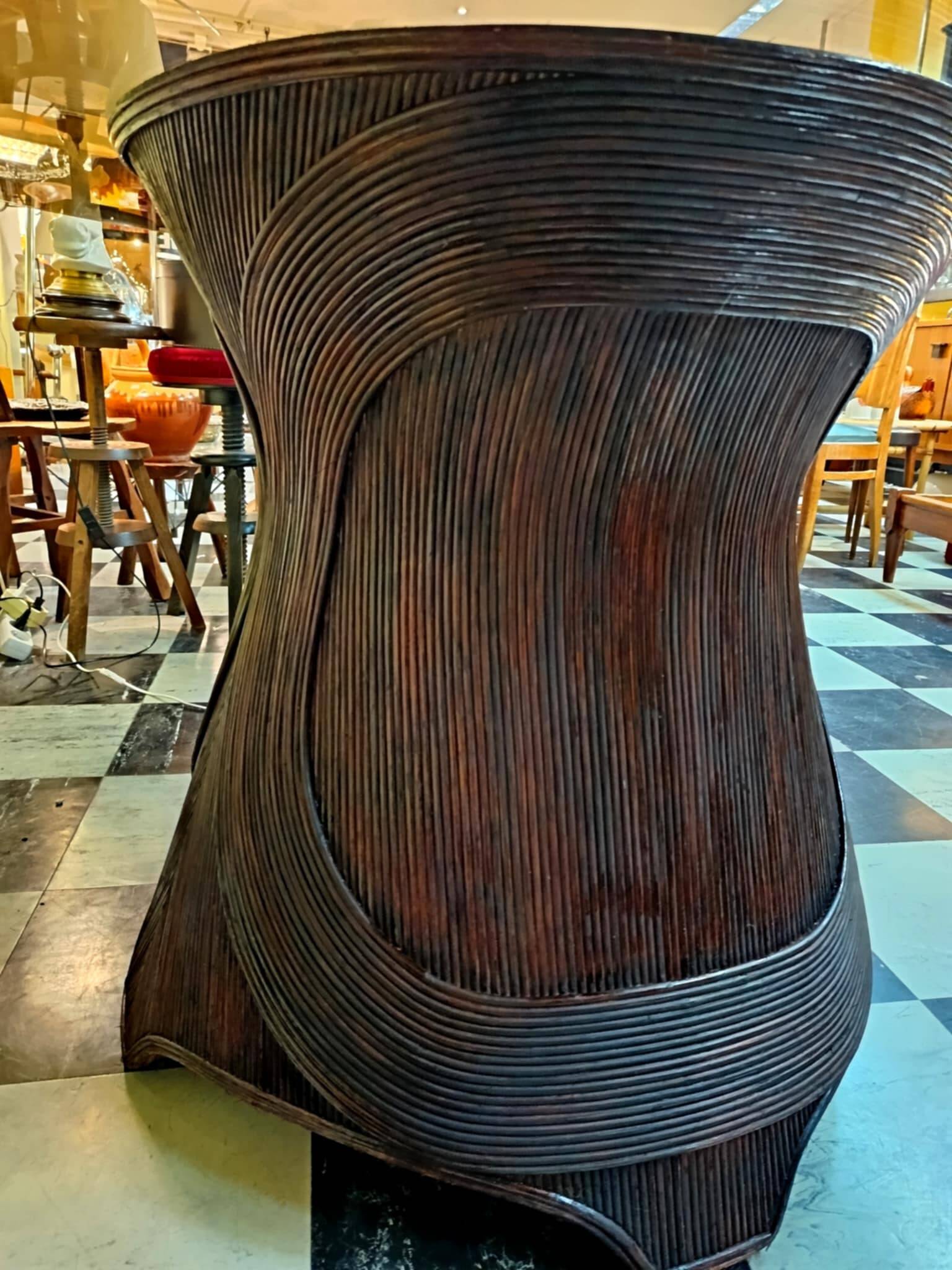 Dining table with rattan marquetry